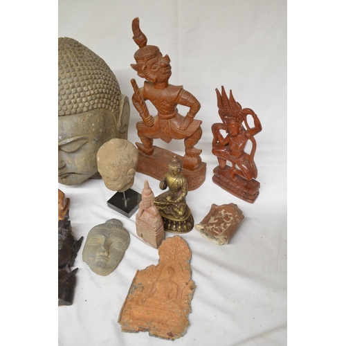 224 - Collection of mostly eastern stone and wood figure carvings to include Buddha, Thai temple guard, so... 