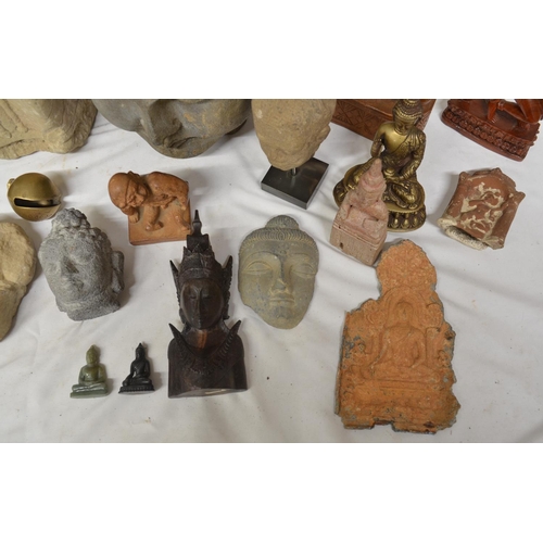 224 - Collection of mostly eastern stone and wood figure carvings to include Buddha, Thai temple guard, so... 