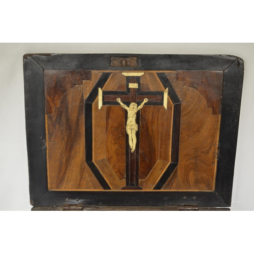 23 - Circa 17th century oak sacrament box with external panelling and ornate internal Christ on the cross... 