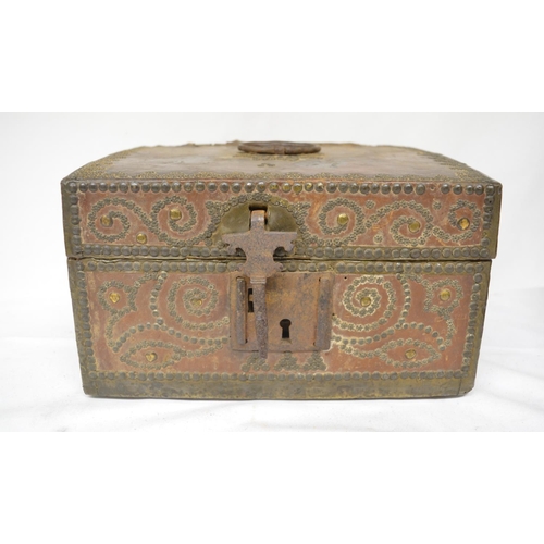 24 - Circa 17th century leather bound table box with wrought metal flap lock and ornate metal pinned desi... 