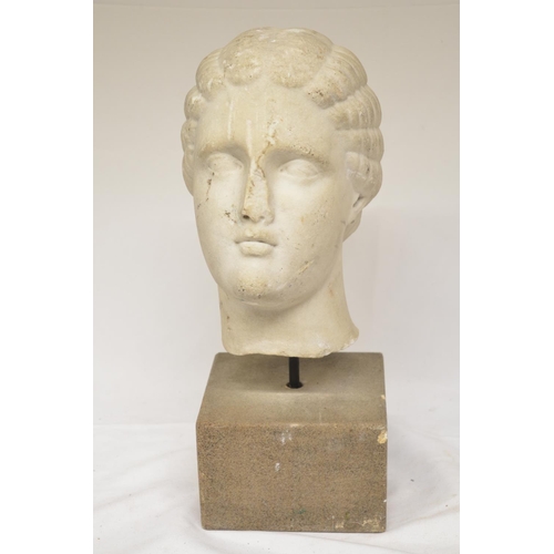 30 - Marble carved head of a Roman style lady/Aphrodite with platted hair set on stone plinth. H36cm (Vic... 