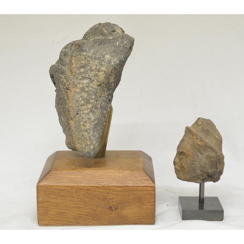 37 - Two carved stone heads on wood and stone plinths, origins unknown, larger carving with plinth 23cm. ... 