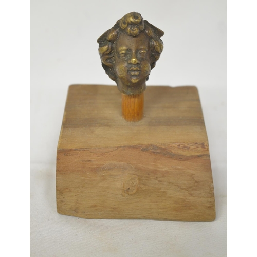 41 - Small cast metal Romanesque head on wood plinth, overall H8cm (Victor Brox collection)