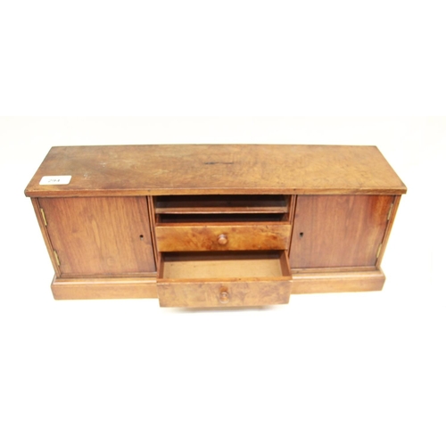 294 - Early 20th century walnut table cabinet with 2 x cupboard doors (locked) and open center with two dr... 