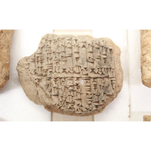 87 - Five Mesopotamian sun backed clay tablets, c2100 B.C., cuneiform writing,  (Victor Brox collection)
