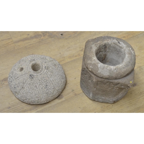 28 - Carved stone mortar with lettering to the upper sides W24xD18xH27.5cm and a circular domed millstone... 