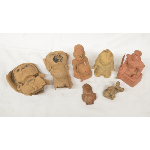 65 - Collection of terracotta clay antiquities from various civilizations, including a South American whi... 