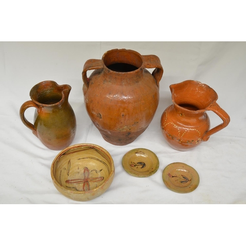 67 - Collection of clay pots including a slipware jug and olive jar, various styles and ages, some with a... 