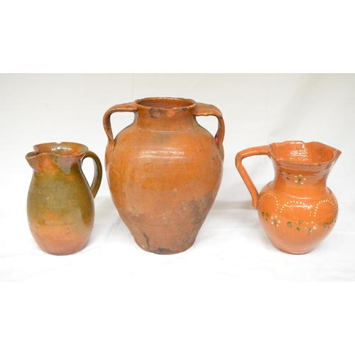 67 - Collection of clay pots including a slipware jug and olive jar, various styles and ages, some with a... 