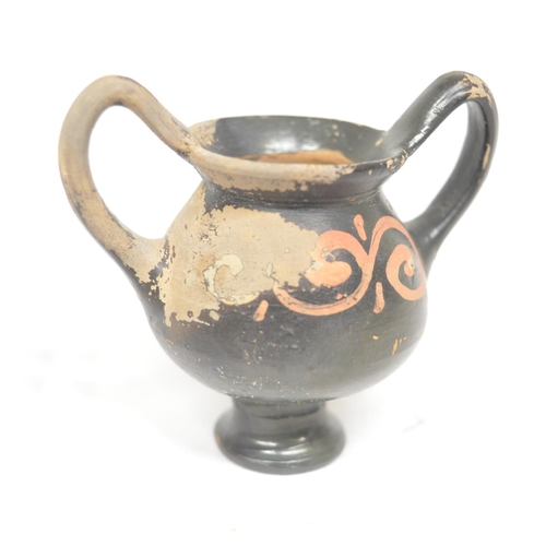 70 - Small collection of Grecian and Mediterranean pottery, to include an attic red-figure vase with sign... 