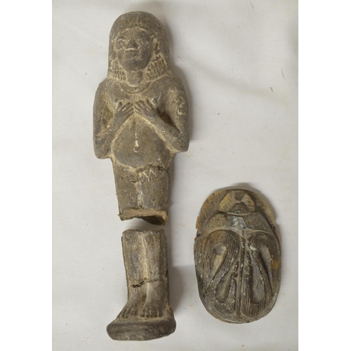 77 - Collection of mostly Egyptian stone and clay figures, mostly modern. Also a small grindstone with ca... 