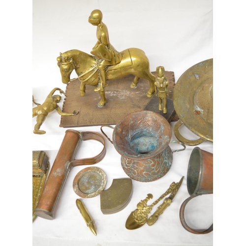 81 - Collection of brass and copper ware to include copper measuring vessels, brass mounted knight, balle... 