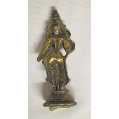 85 - Small 18th/19th century solid metal figure of an Indian deity, H6.5cm (Victor Brox collection)