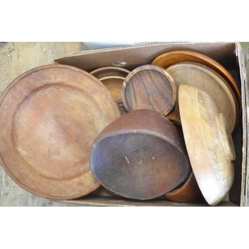 95 - A large collection of carved wooden items from across Africa, including turned plates and bowls, gob... 