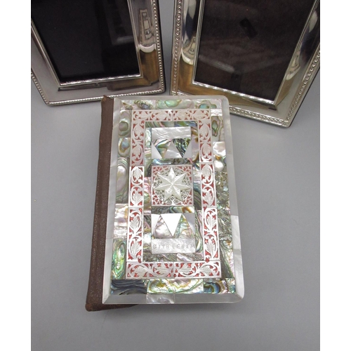 1030 - Holy Bible with applied front made from carved mother of pearl and paua shell with order of the Holy... 