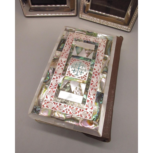 1030 - Holy Bible with applied front made from carved mother of pearl and paua shell with order of the Holy... 