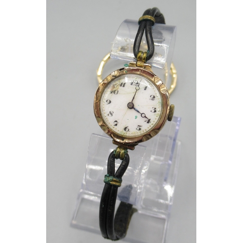 1346 - Ladies Texa 9ct gold wristwatch on rolled gold expanding bracelet, signed silvered engine turned Ara... 