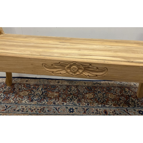 1317 - Carved wood bench with central floral motif, 106 x 64 x 36cm