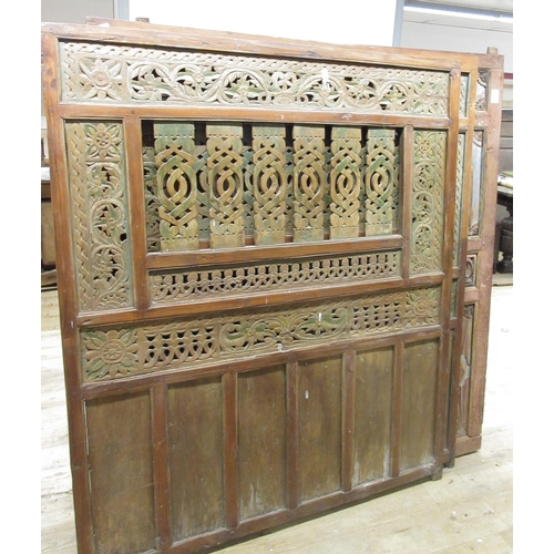 967 - Three Javanese hardwood polychrome painted and pierced panels, WS143cm H168cm max (3) Provenance; In... 