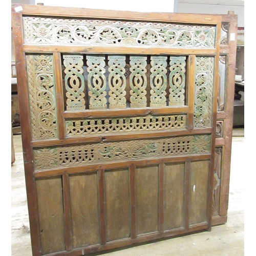 967 - Three Javanese hardwood polychrome painted and pierced panels, WS143cm H168cm max (3) Provenance; In... 