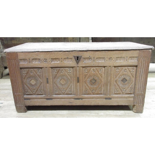 968 - 18th century oak coffer, later planked top above four geometric with stop fluted supports, lozenge c... 