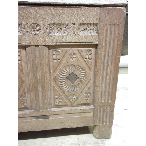 968 - 18th century oak coffer, later planked top above four geometric with stop fluted supports, lozenge c... 