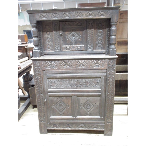 972 - Small oak court cupboard, with lozenge caved panels, arcades and stylized foliage, W94cm D46cm H147c... 