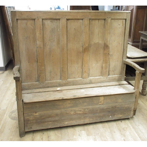 989 - 19th century Country made pine box settle, five panel back, shaped arms and lifting seat, W153cm D46... 