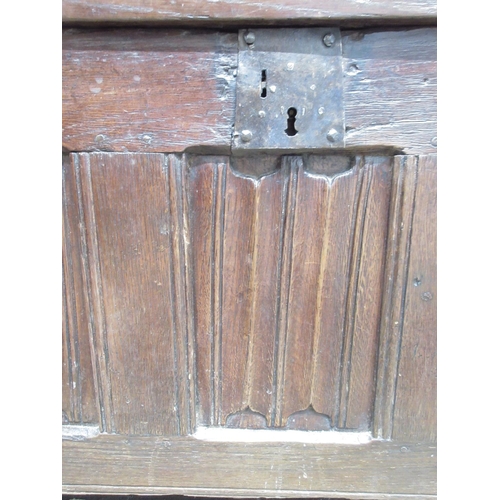 992 - 18th century oak coffer, hinged three panel lid and three linenfold panel front, W104cm D51cm H75cm ... 