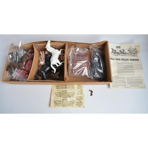 1447 - Two vintage unstarted horse and coach/cart plastic model kits to include Lindberg 1/16 Wells Fargo O... 