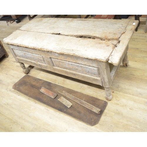 962 - Country made preparation table, cleated planked top with panelled frieze on turned and block support... 