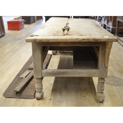 962 - Country made preparation table, cleated planked top with panelled frieze on turned and block support... 