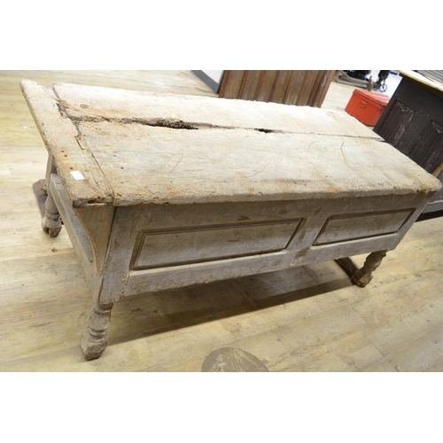 962 - Country made preparation table, cleated planked top with panelled frieze on turned and block support... 