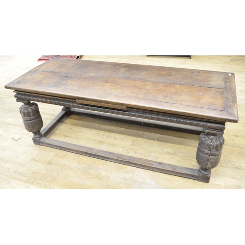 973 - Elizabethan style oak rectangular refectory draw leaf dining table, with lobed frieze on cup and cov... 