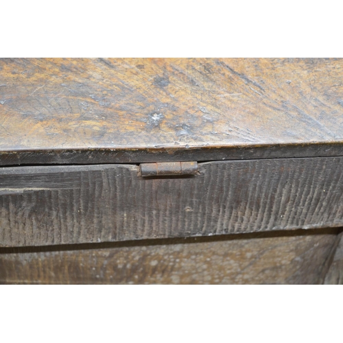 981 - 18th century oak coffer, hinged lid with incised line detail, panel front carved with lunettes, stra... 