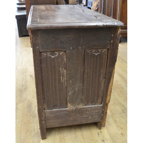 984 - 18th century French oak side cabinet, hinged top above two doors carved with strapwork, W129cm D63cm... 