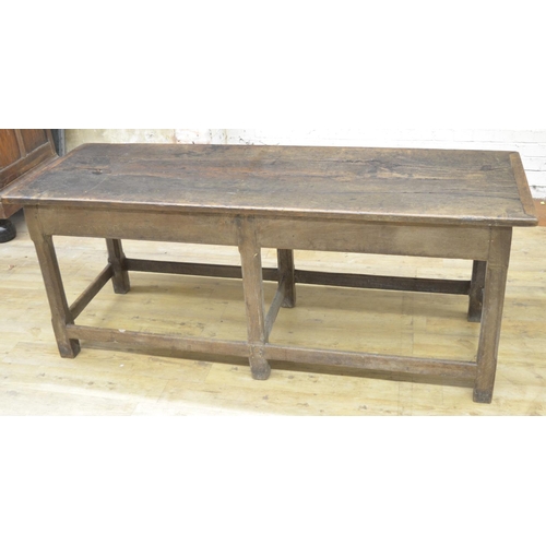 993 - Oak refectory style dining table, rectangular two piece top on six faceted supports joined by stretc... 