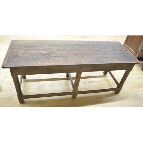 993 - Oak refectory style dining table, rectangular two piece top on six faceted supports joined by stretc... 