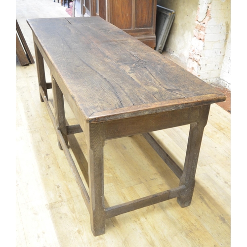 993 - Oak refectory style dining table, rectangular two piece top on six faceted supports joined by stretc... 