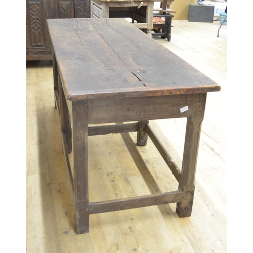 993 - Oak refectory style dining table, rectangular two piece top on six faceted supports joined by stretc... 