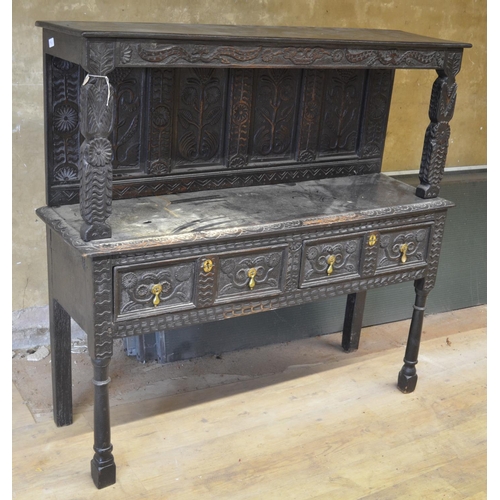 996 - 18th century and later oak dresser, raised back with four flower carved panels, above two drawers, o... 