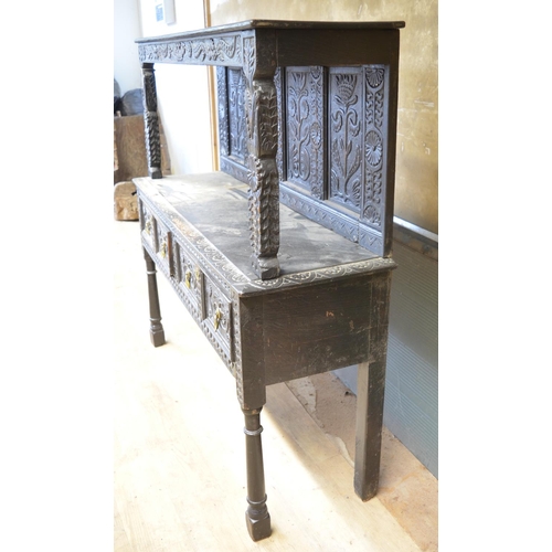 996 - 18th century and later oak dresser, raised back with four flower carved panels, above two drawers, o... 