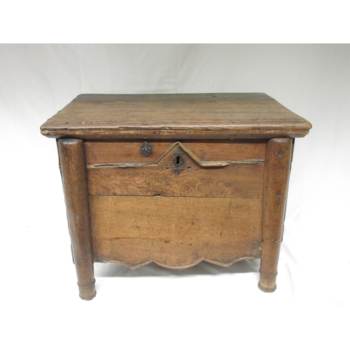 991 - Small French oak and elm box, hinged top above moulded front with shaped frieze, turned supports, W6... 