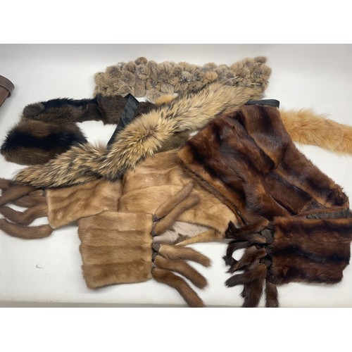 1270 - Two brown fur stoles with mink tails, one labelled Walter Kerner, three fur scarves, and a mink stol... 