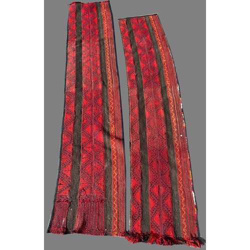 1475 - Pair of 20th century red ground Caucasian wool runners with central geometric repeating zig zag patt... 