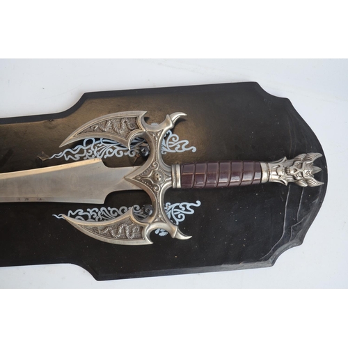 22 - Replica metal bladed fantasy sword from Ancient Warrior (series unknown) with wall mounting display ... 
