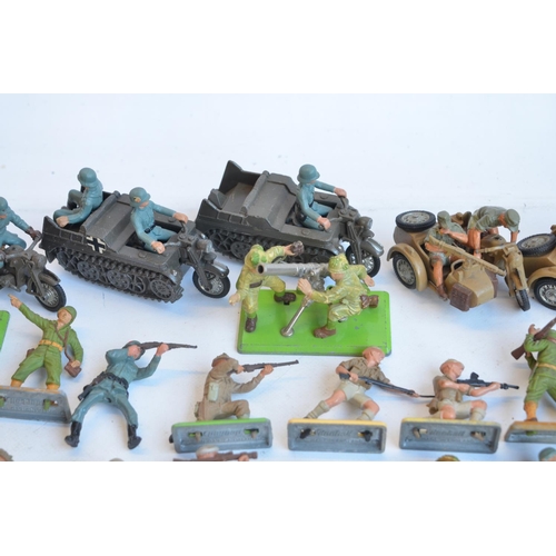 27 - Collection of mostly Britain's Deetail WWII and postwar toy soldier figures including vehicles. Also... 