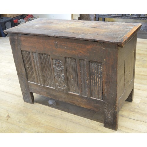 982 - 17th century oak coffer, hinged lid above linen fold and mask head panel front, W137cm D60cm H95cm (... 