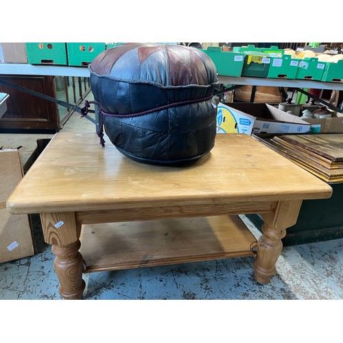 1316A - Leather pouffe, H35cm, and a pine two tier coffee table, turned supports, 92cm x 63cm H47cm (2)