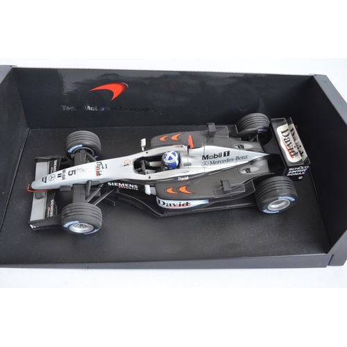 53 - Four 1/18 scale diecast Formula 1 racing car models from Paul's Model Art/Minichamps to include limi... 